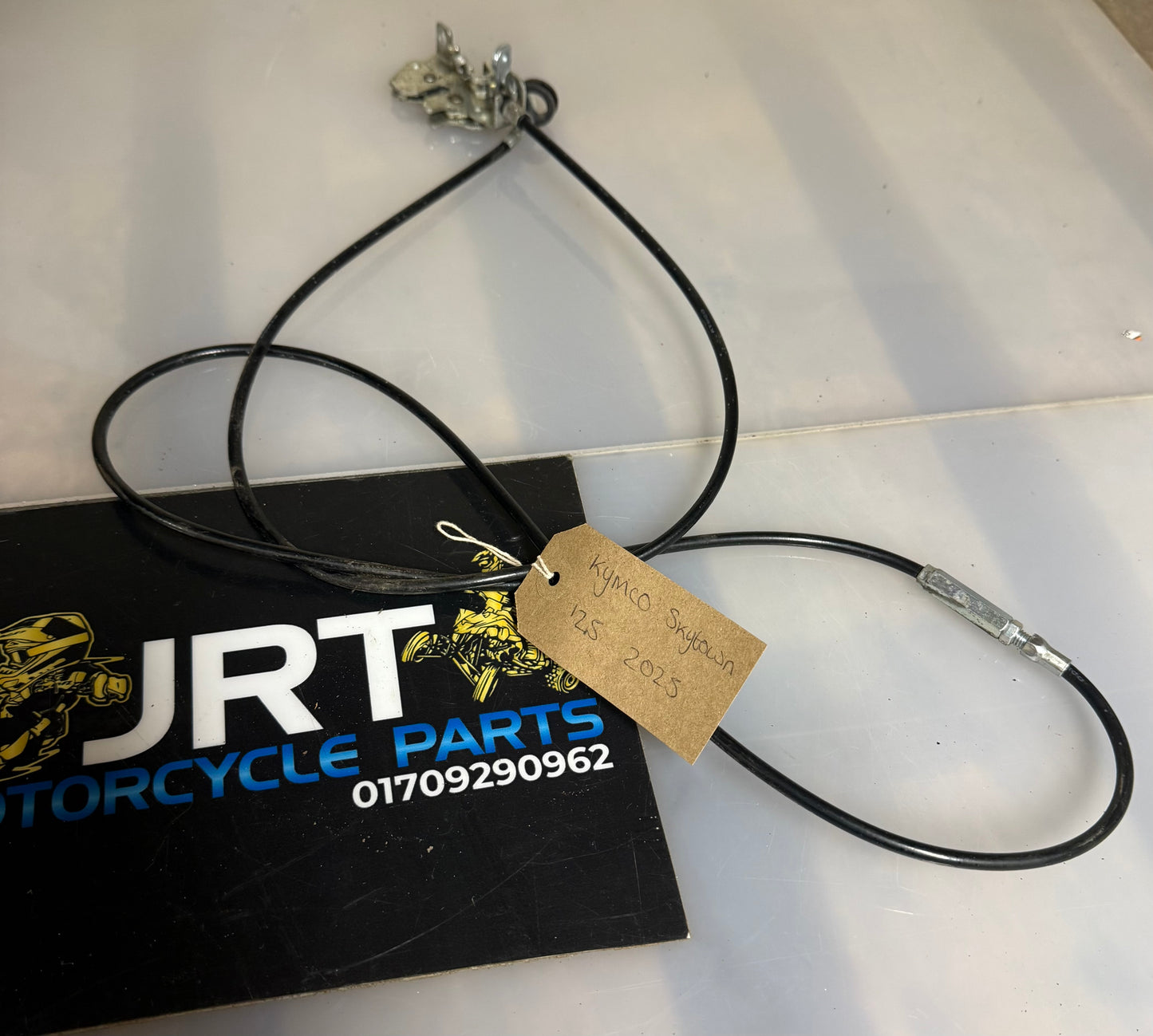 Kymco Skytown 125 seat release with cable