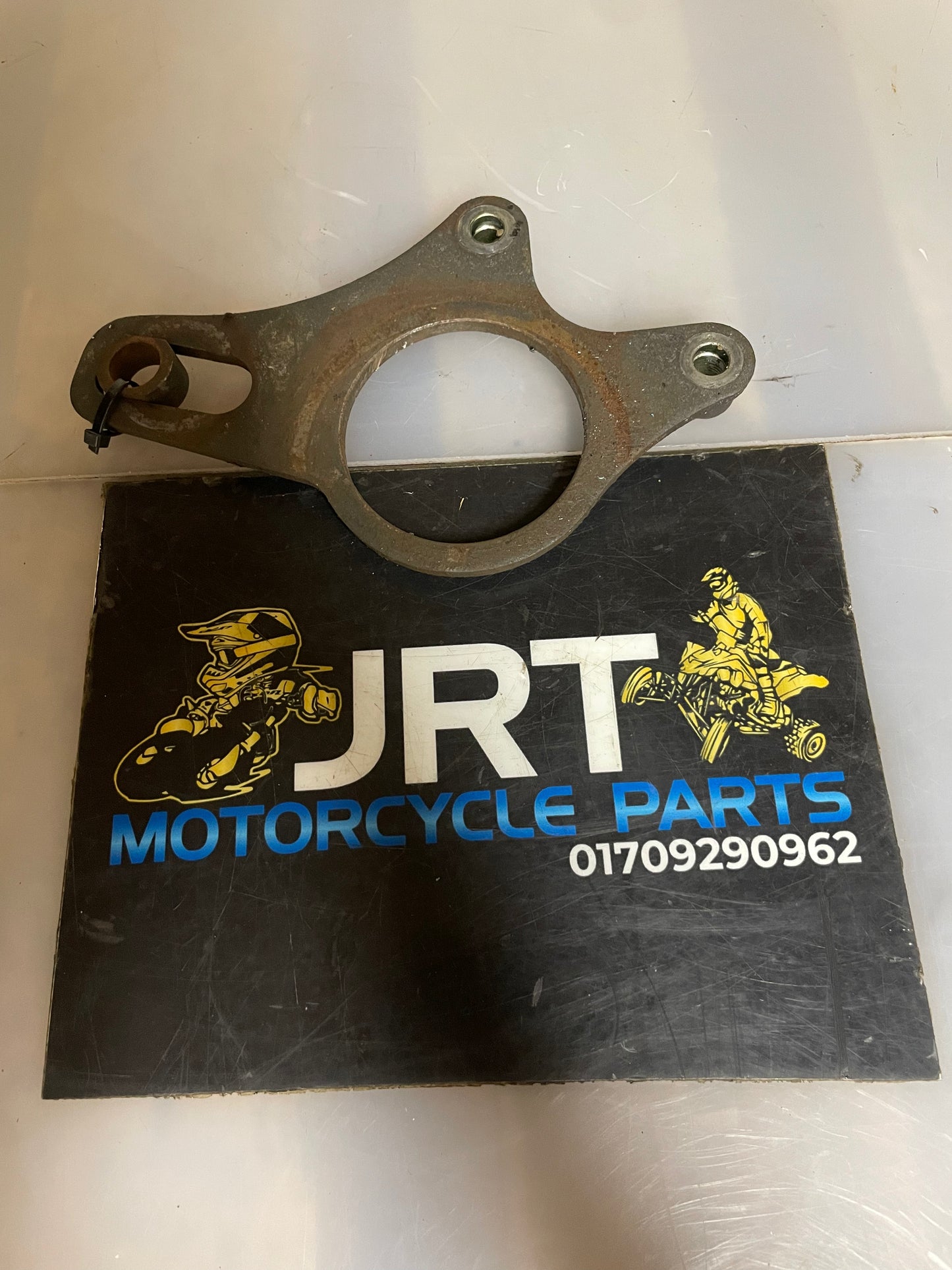 Yamaha Raptor 700 rear brake carrier 2006-13