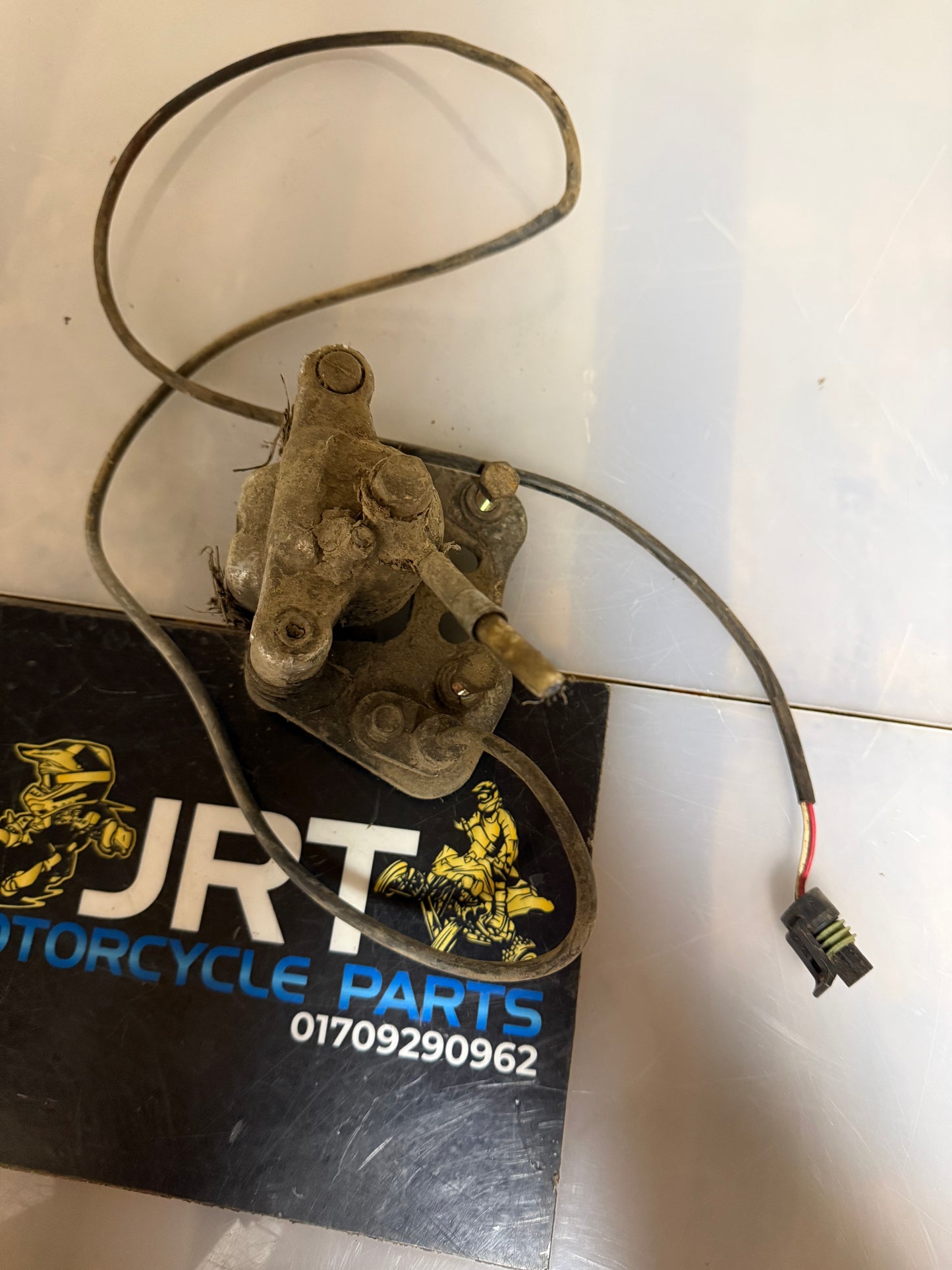 Polaris sportsman 500 H.O 2006 front calliper as a Paris