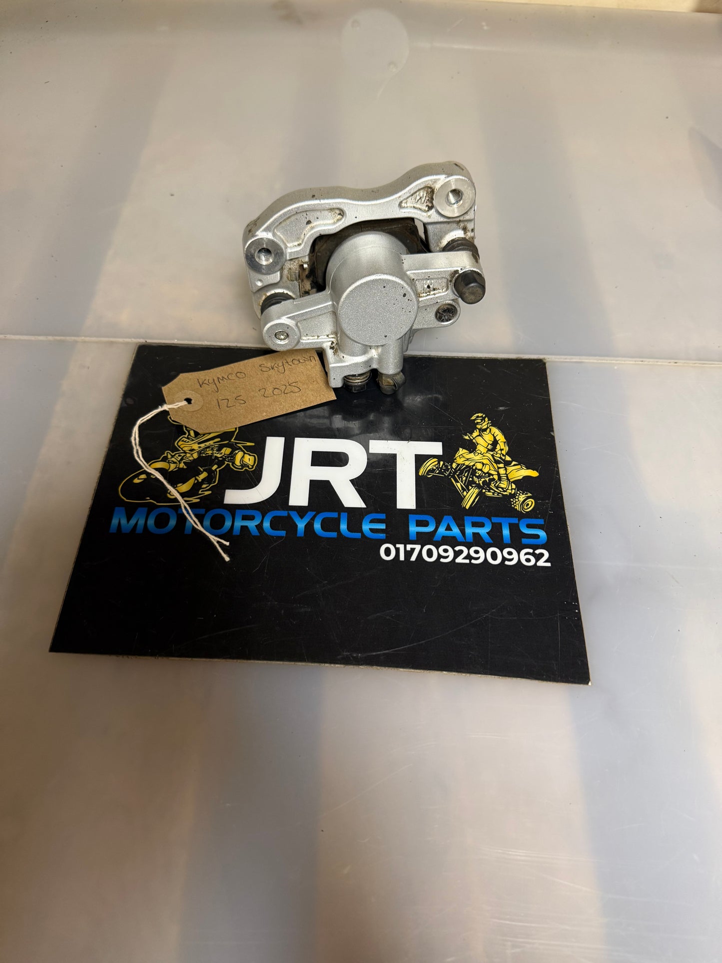 Kymco Skytown 125 rear caliper