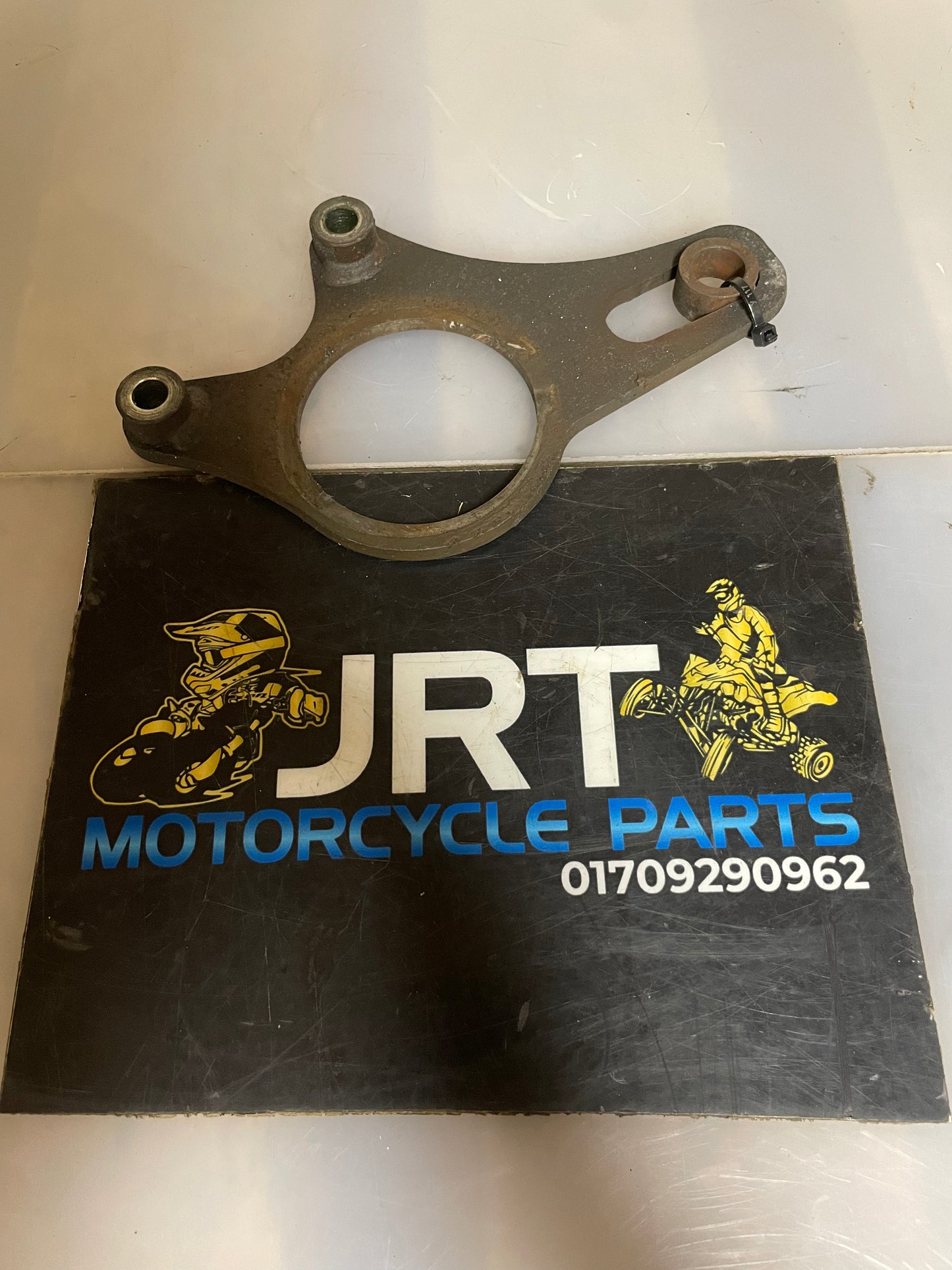 Yamaha Raptor 700 rear brake carrier 2006-13
