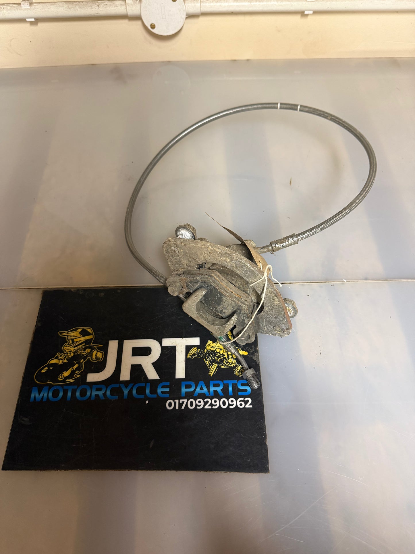 Polaris scrambler 1000 2014 front left caliper