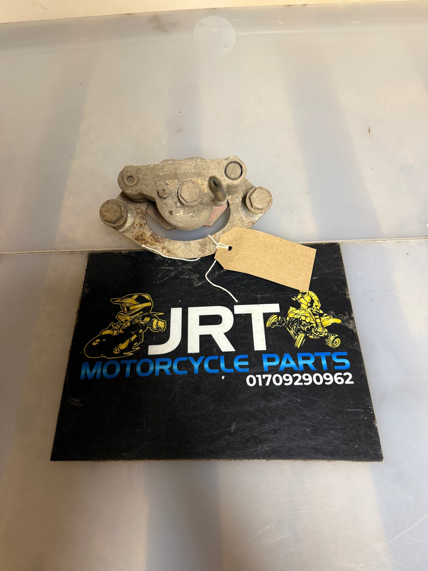 Polaris scrambler 1000 2014 rear caliper