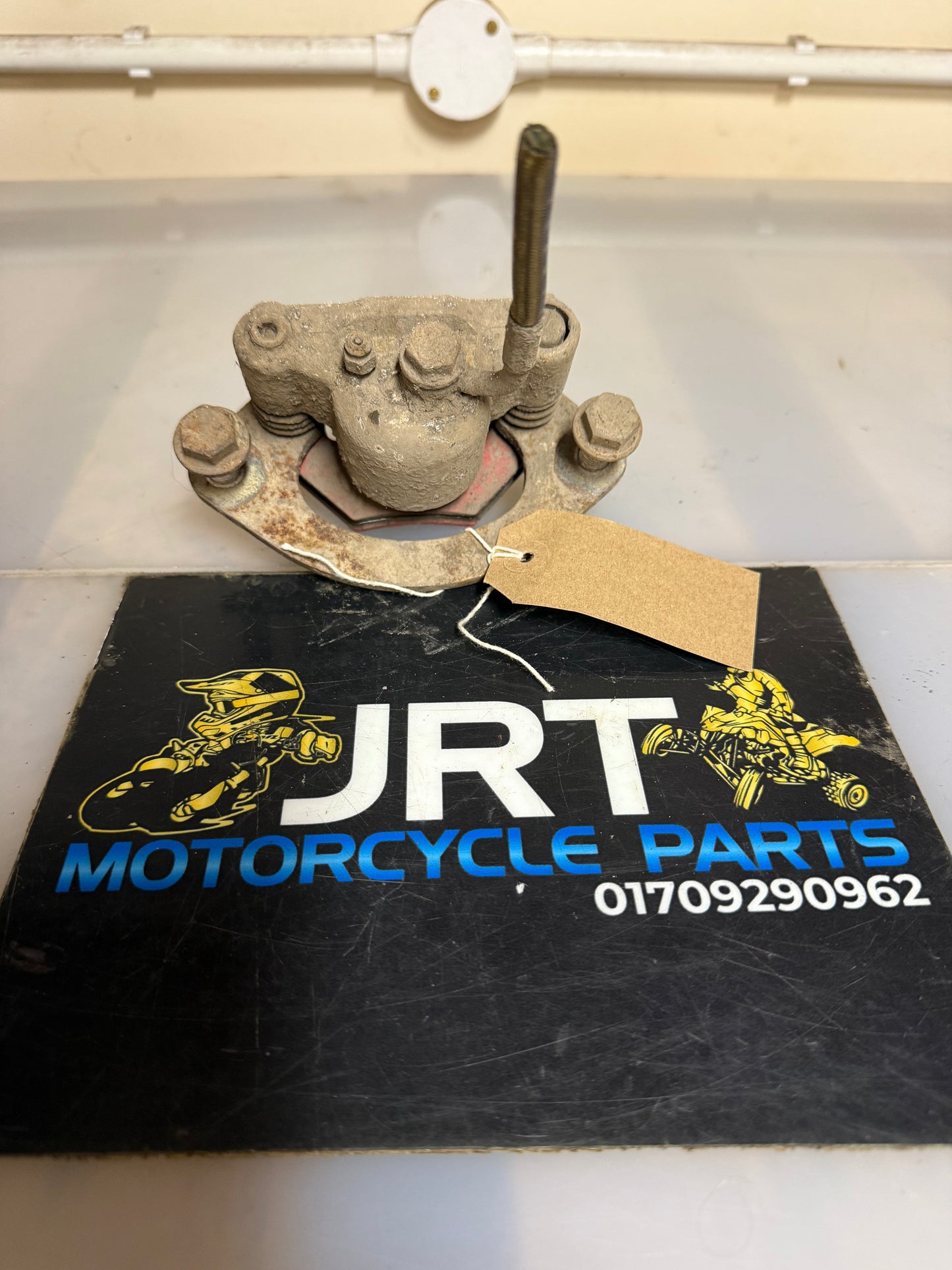 Polaris scrambler 1000 2014 rear caliper