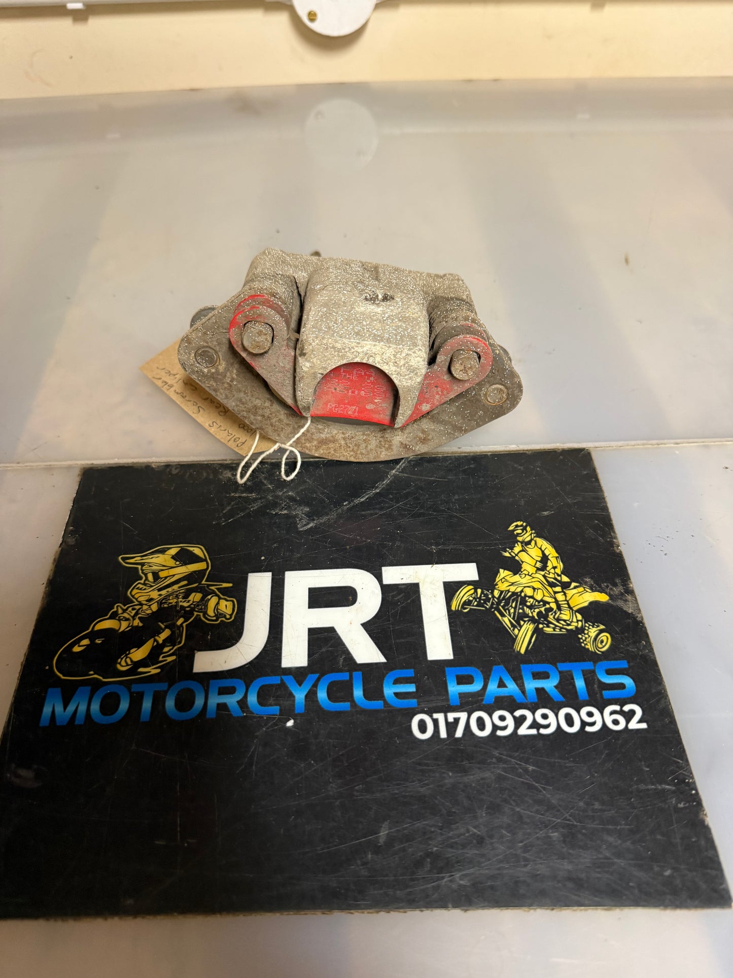 Polaris scrambler 1000 2014 rear caliper