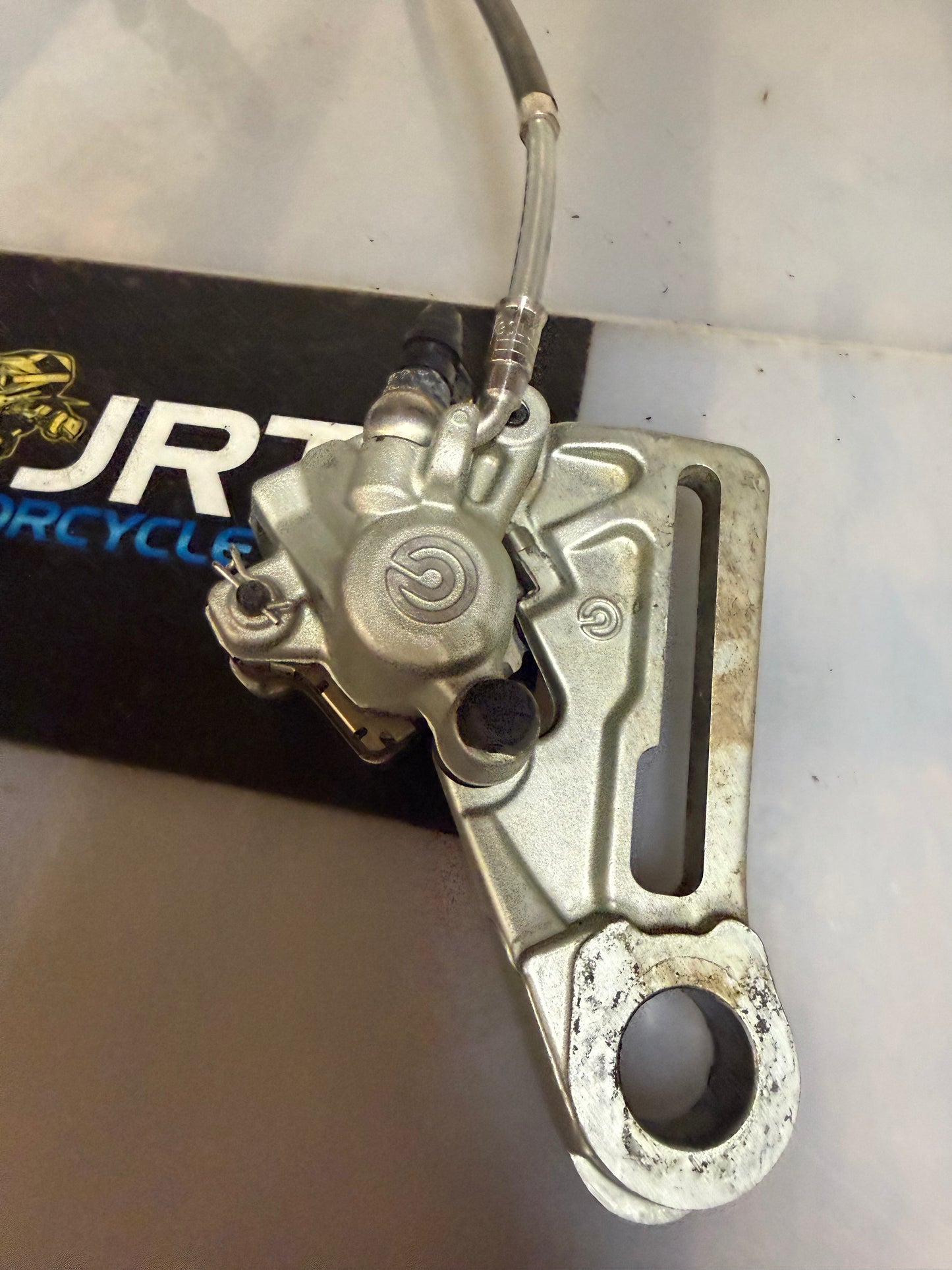 KTM SXF 350 2017 rear brake calliper with mounting bracket and hydronic line